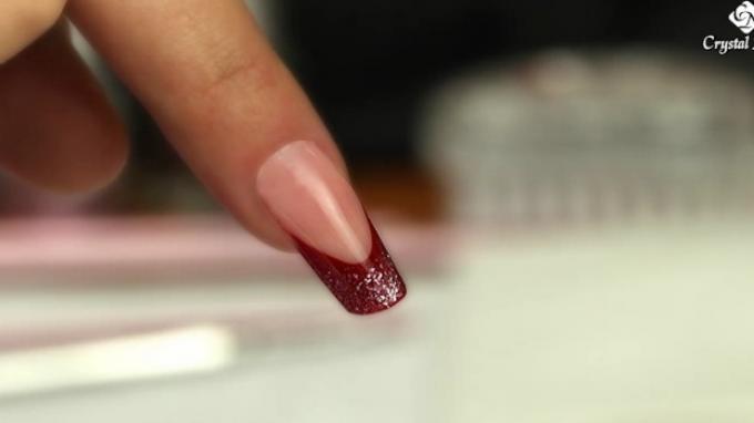 Filling the nail with acrylic